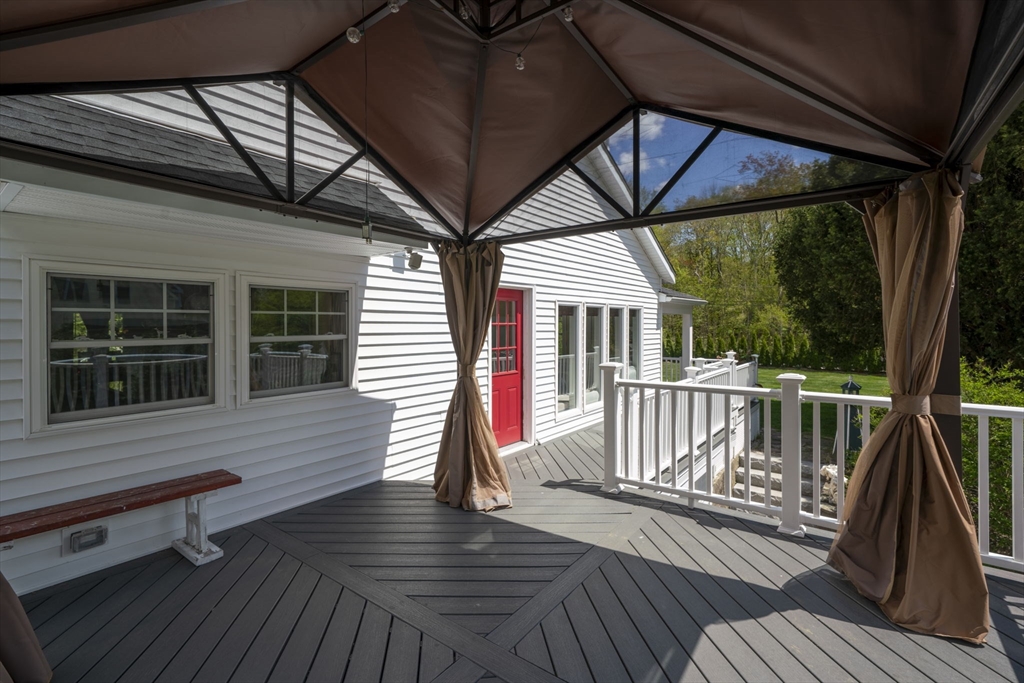 229 Parkerville Road Southborough, MA 01772 - Photo 6 of 38 a view of a two chairs in the deck