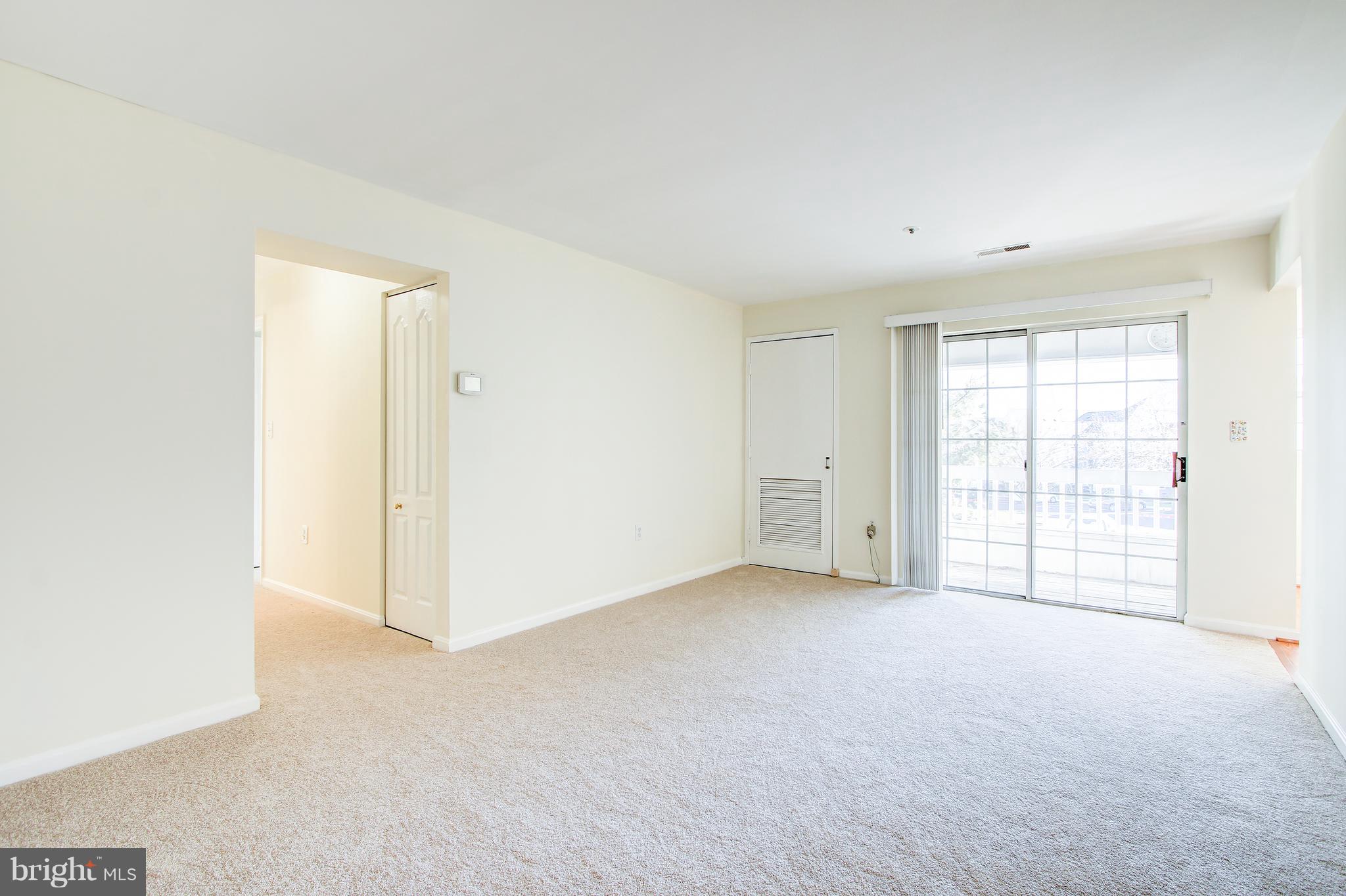 8371 Montgomery Run Road, Unit H Ellicott City, MD 21043 - Photo 17 of 33 Slider off Living Room to Balcony