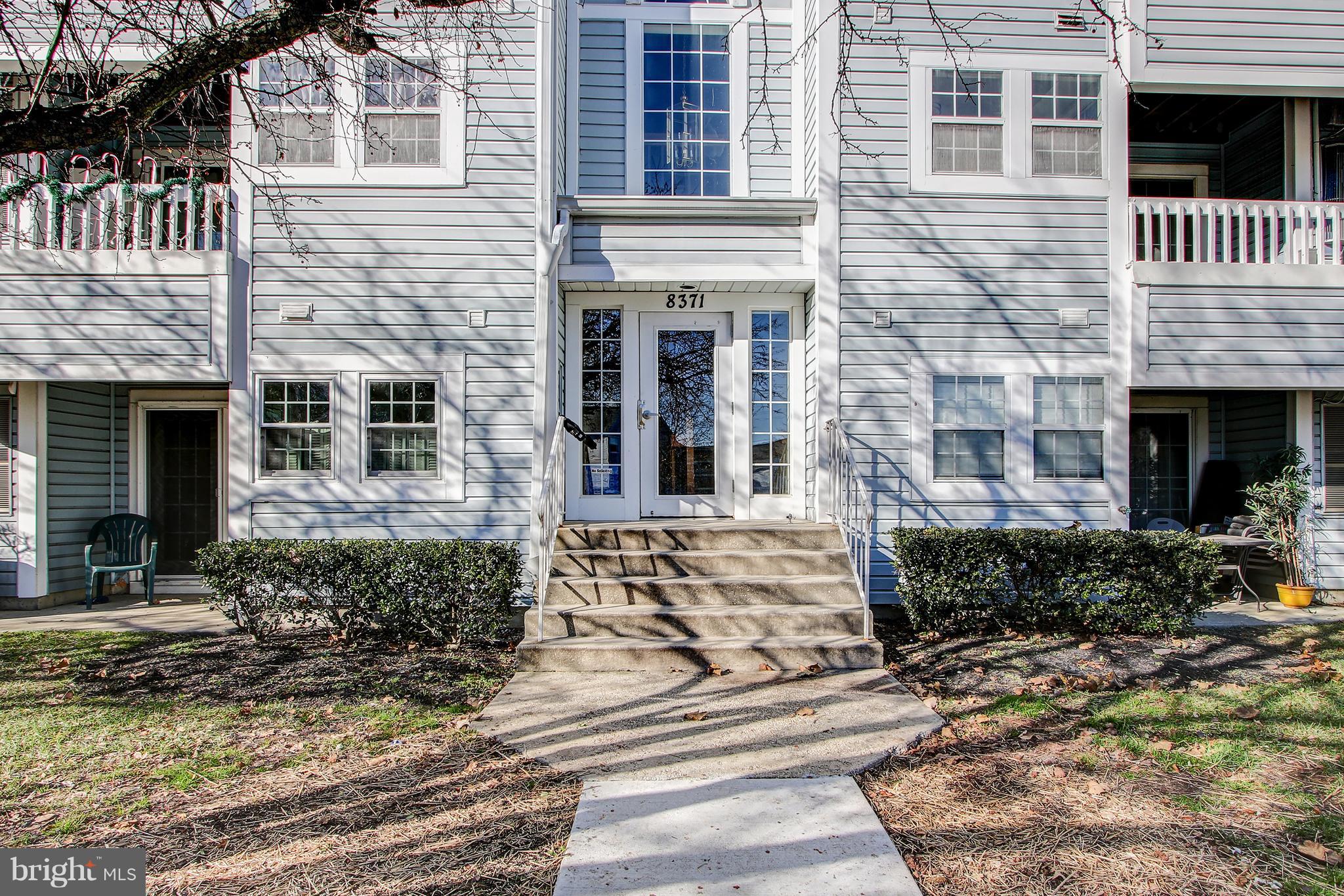 8371 Montgomery Run Road, Unit H Ellicott City, MD 21043 - Photo 3 of 33 Security Front Entrance