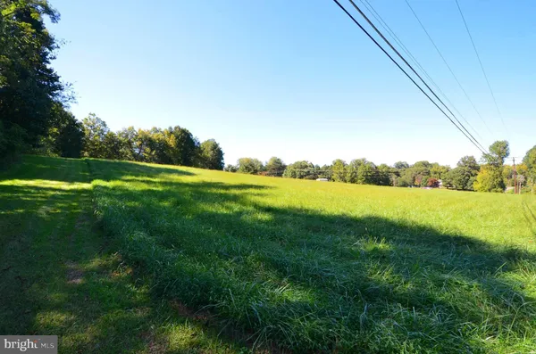 a view of a lake with a big yard