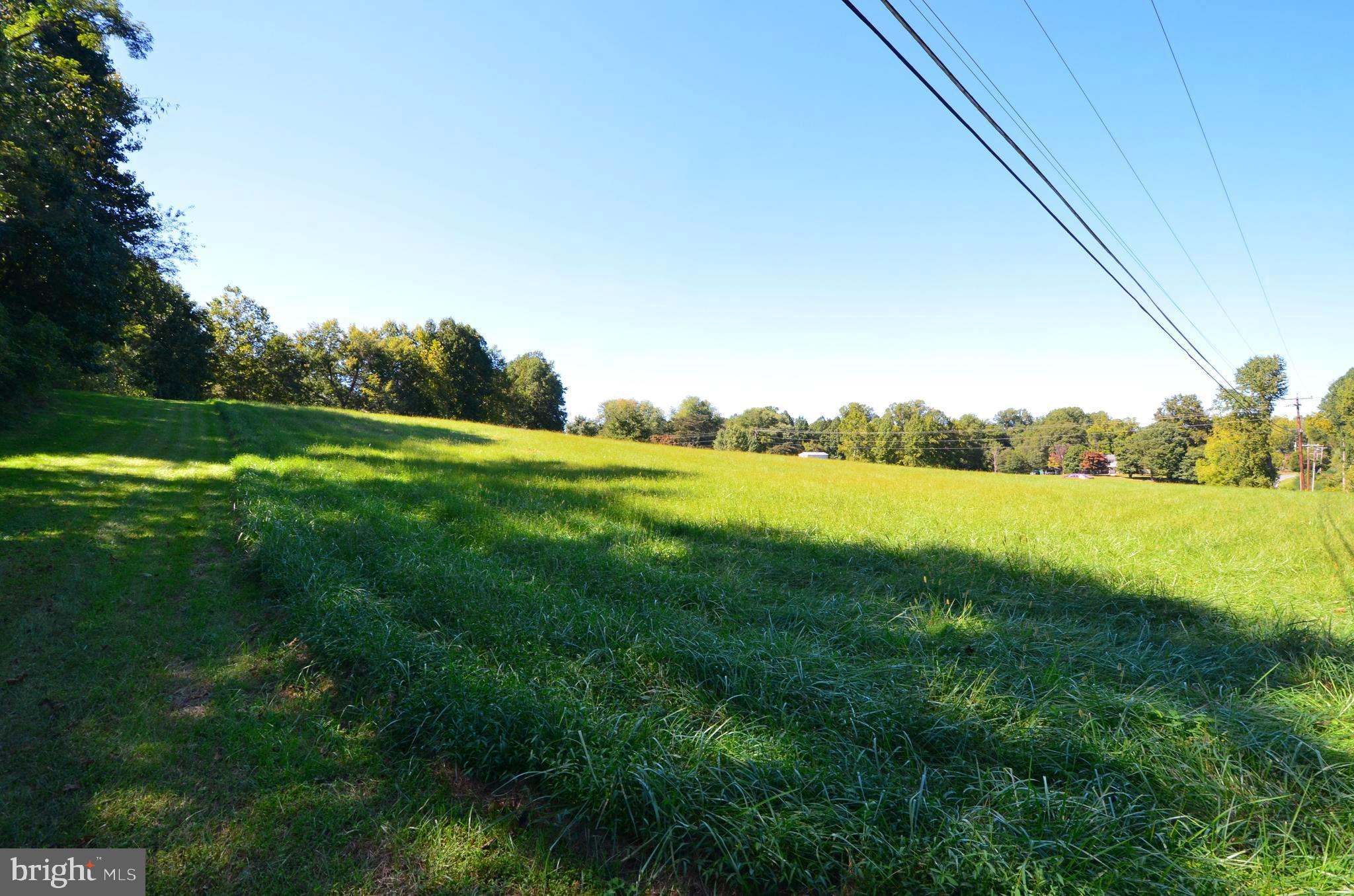 6340 McKendree Road Dunkirk, MD 20754 - Photo 8 of 8 a view of a lake with a big yard