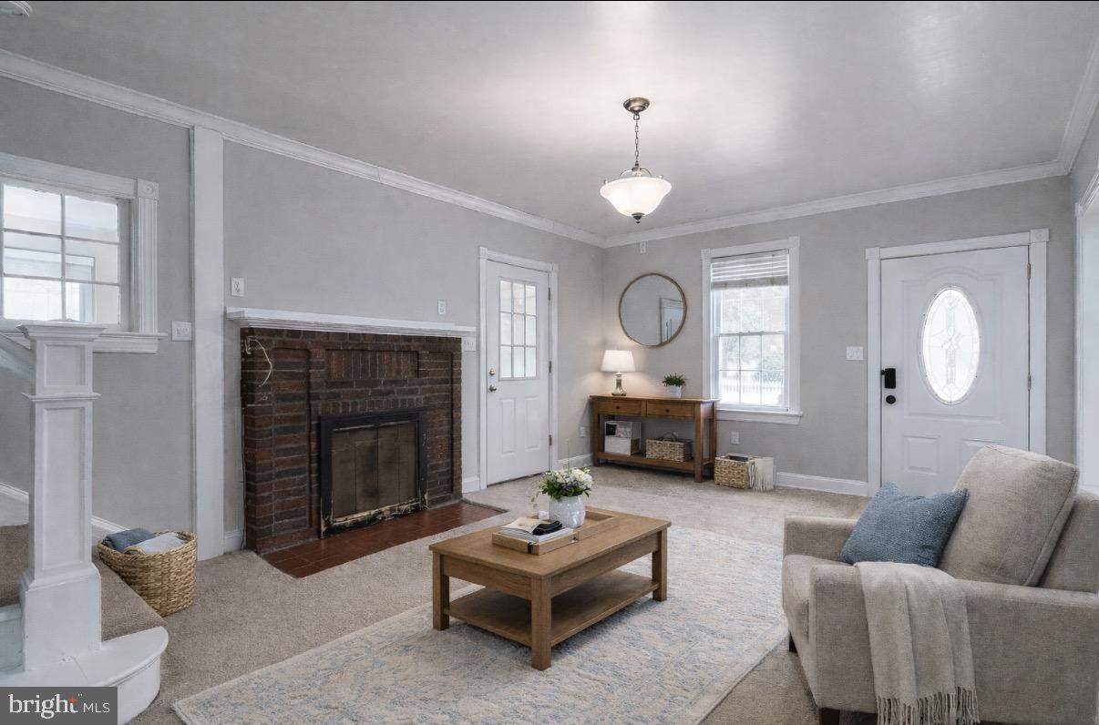 505 Neck Road Burlington, NJ 08016 - Photo 6 of 28 a living room with furniture window and a fireplace