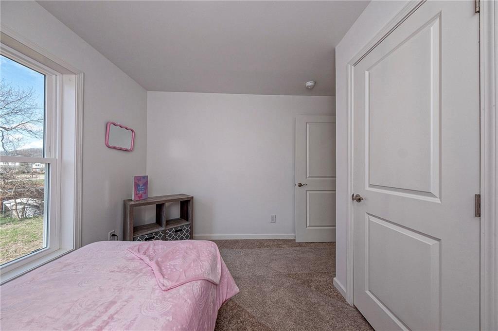 448 Motheral Avenue Monessen, PA 15062 - Photo 12 of 20 a bedroom with a bed and a window