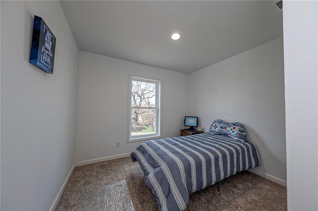 448 Motheral Avenue Monessen, PA 15062 - Photo 14 of 20 a bedroom with a bed and a window