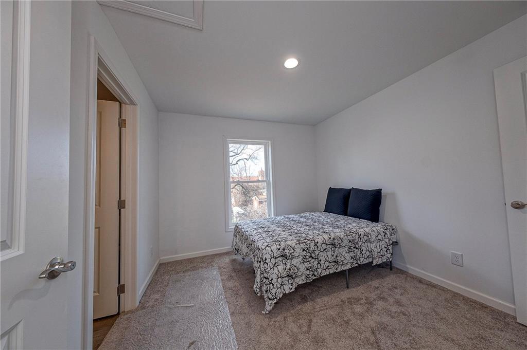 448 Motheral Avenue Monessen, PA 15062 - Photo 17 of 20 a room with a bed and a window