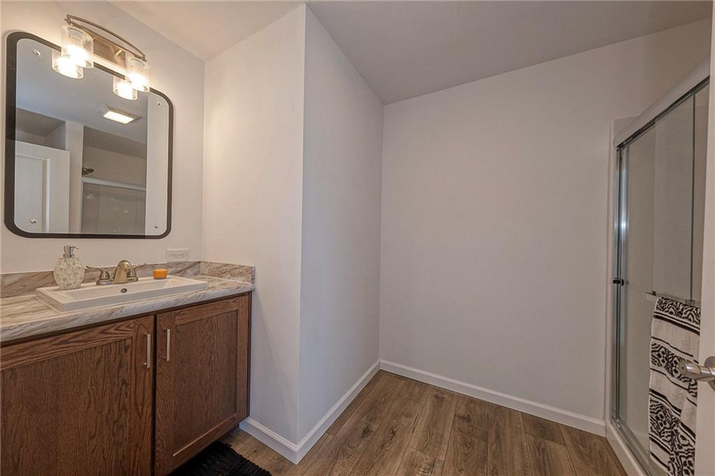 448 Motheral Avenue Monessen, PA 15062 - Photo 19 of 20 a bathroom with a sink and a mirror