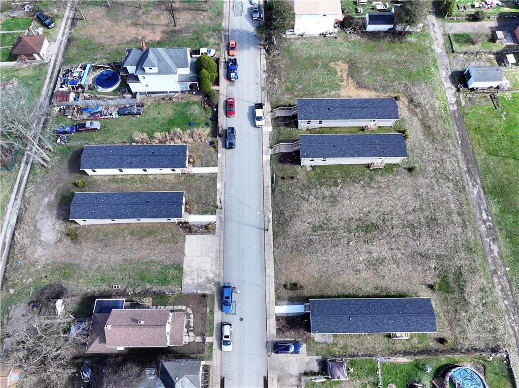 448 Motheral Avenue Monessen, PA 15062 - Photo 2 of 20 an aerial view of a house with a garden