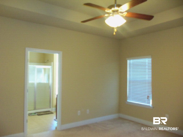 10476 Fionn Loop Daphne, AL 36526 - Photo 11 of 21 Master bedroom suite in the back of the home gives added privacy.