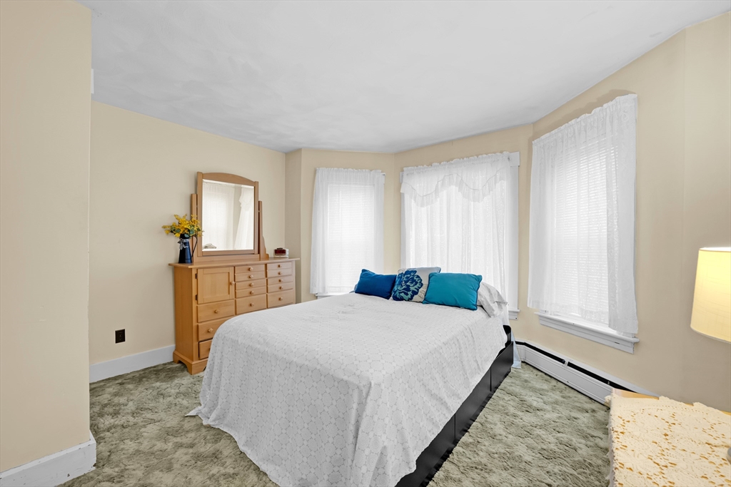 54 Airport Road Fitchburg, MA 01420 - Photo 12 of 38 a bedroom with a bed and a window