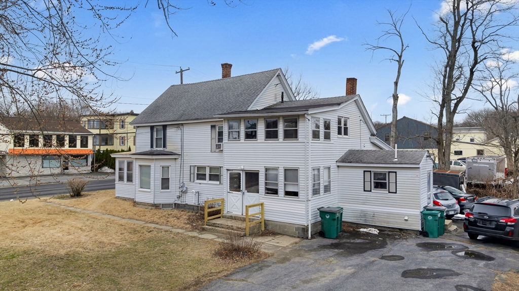 54 Airport Road Fitchburg, MA 01420 - Photo 28 of 38 front view of a house with a street