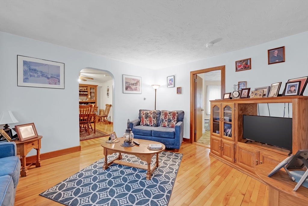 54 Airport Road Fitchburg, MA 01420 - Photo 7 of 38 a living room with furniture and a flat screen tv