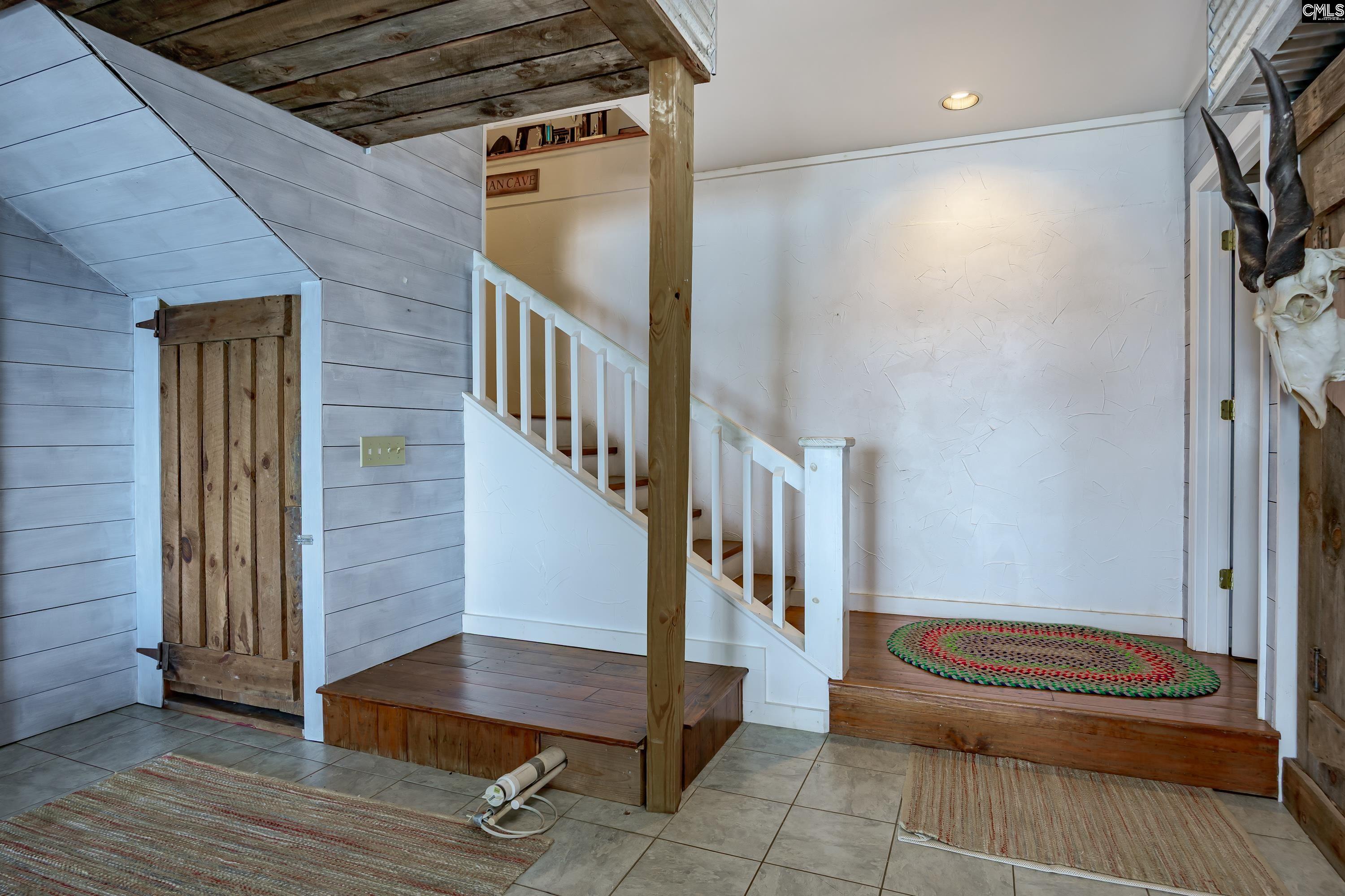 2577 Harbor View Road Camden, SC 29020 - Photo 35 of 42 a view of entryway and hall with wooden floor
