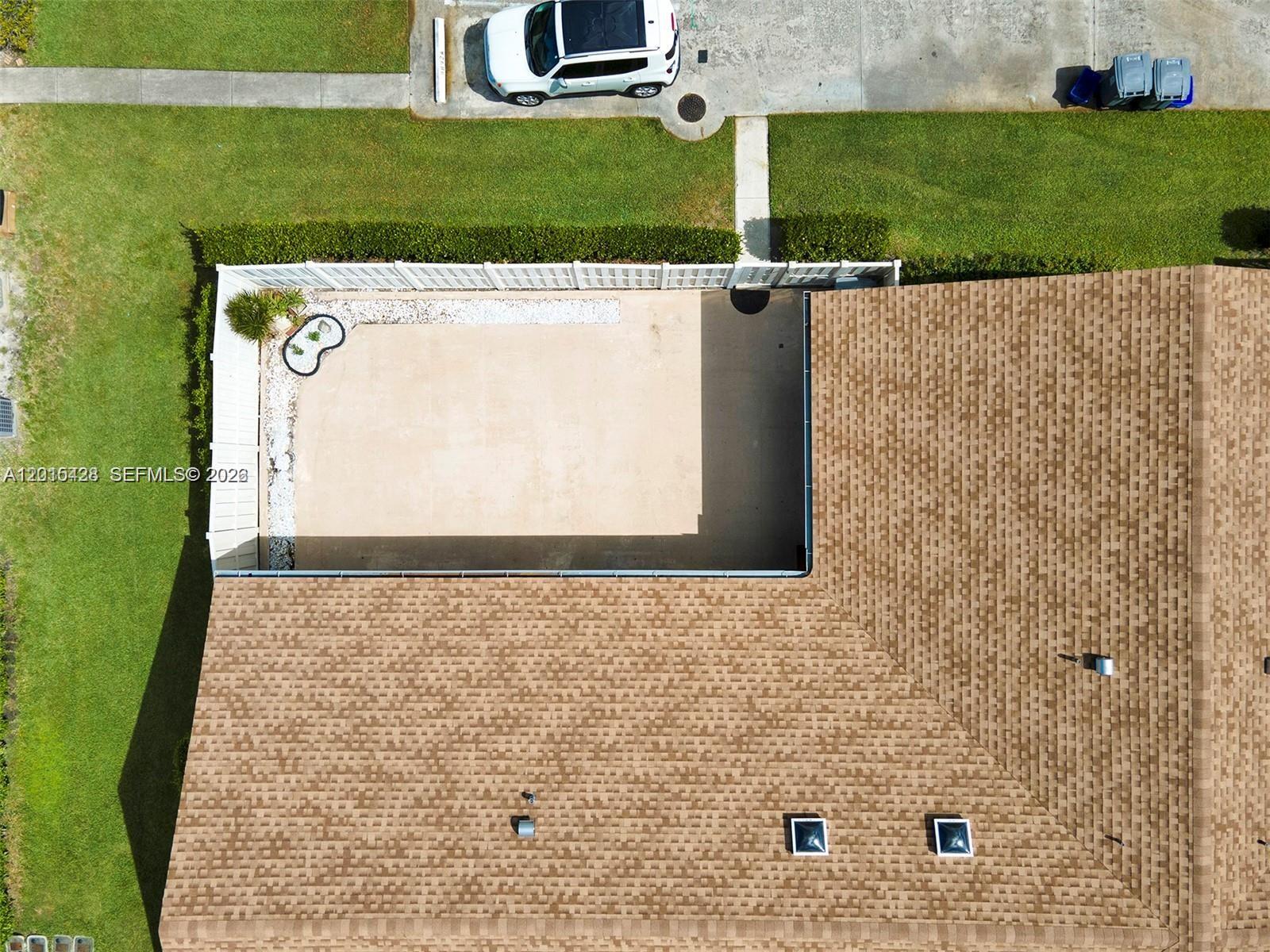 9892 Boca Gardens Parkway, Unit A Boca Raton, FL 33496 - Photo 25 of 32 view of a door with an outdoor space