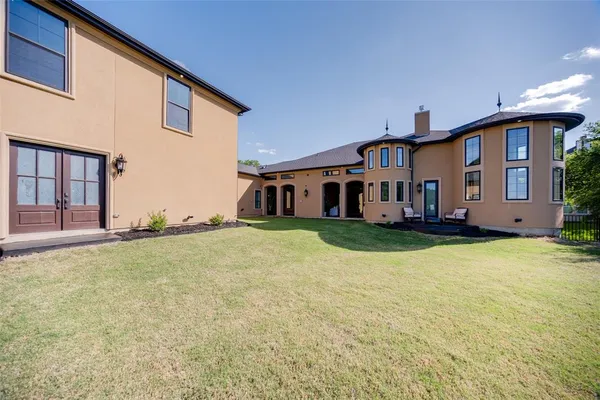 front view of a house with a big yard
