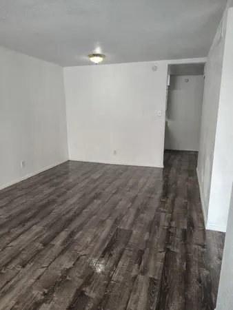 a stove top oven sitting inside of a kitchen