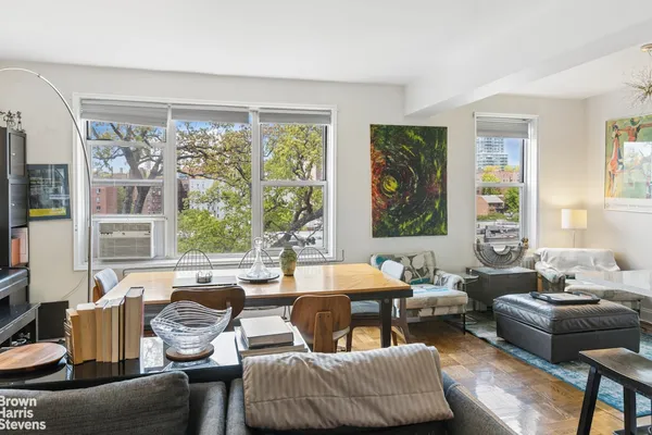 a living room with furniture and a window