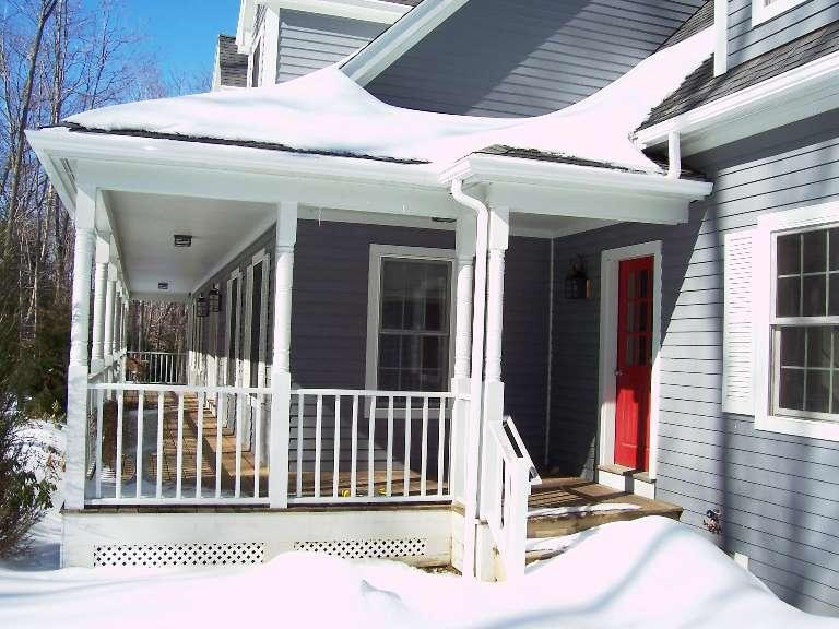1 Hemlock Road Tyringham, MA 01264 - Photo 2 of 19 a view of a house with a small yard and wooden fence