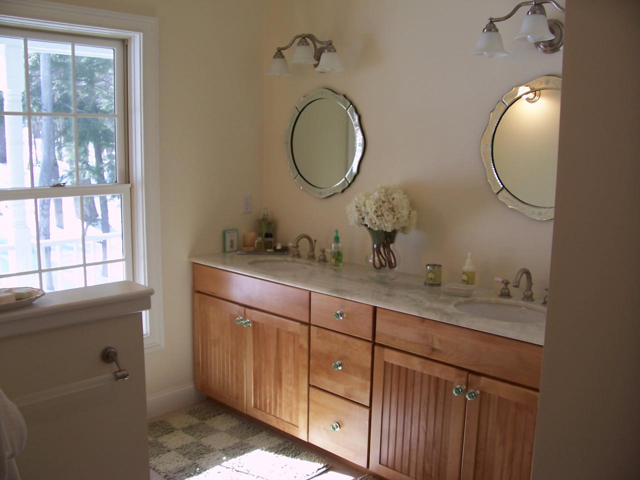 1 Hemlock Road Tyringham, MA 01264 - Photo 12 of 19 a bathroom with a granite countertop double vanity sink and a mirror