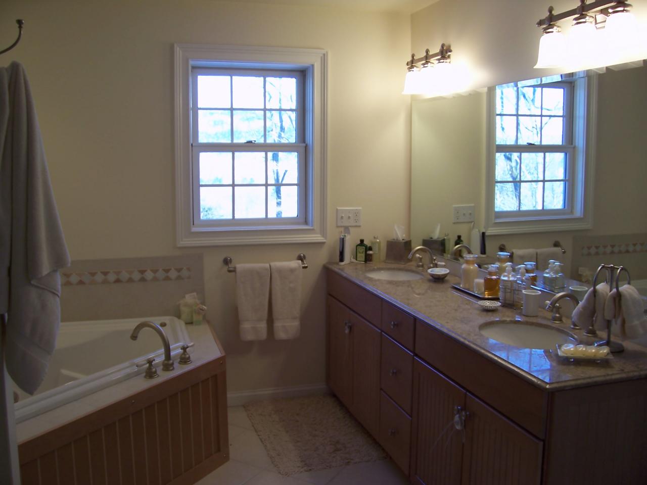 1 Hemlock Road Tyringham, MA 01264 - Photo 14 of 19 a bathroom with a bathtub a sink a window and a shower