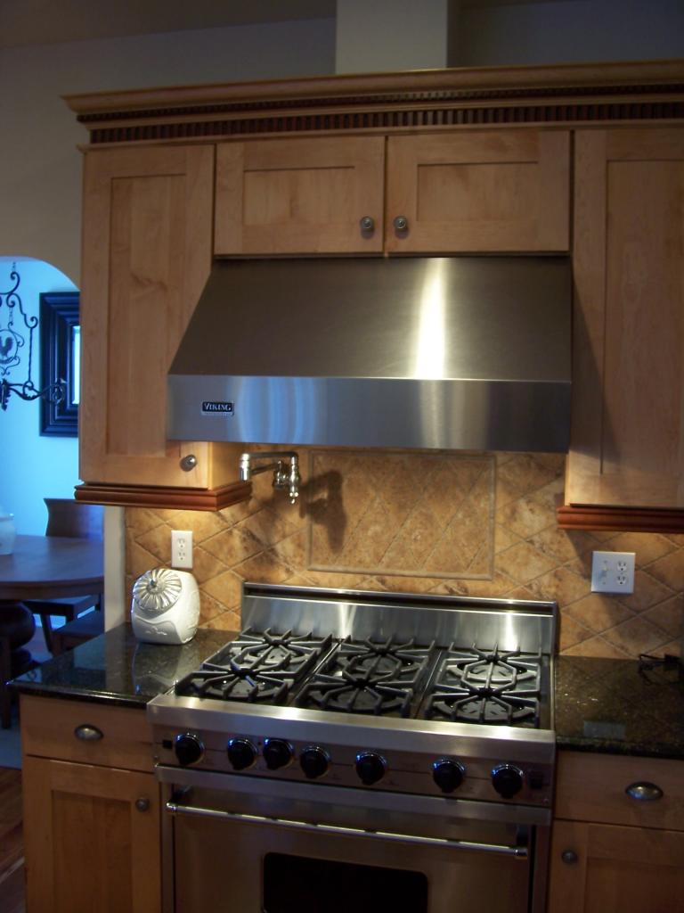 1 Hemlock Road Tyringham, MA 01264 - Photo 7 of 19 a stove top oven sitting inside of a kitchen