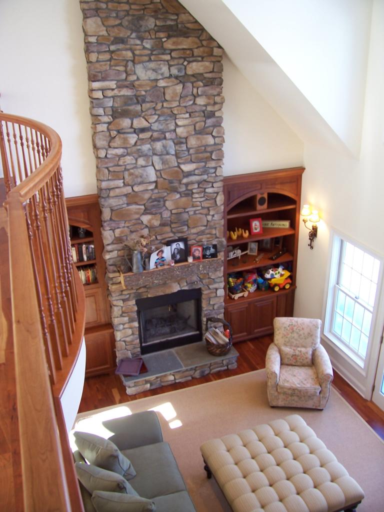 1 Hemlock Road Tyringham, MA 01264 - Photo 9 of 19 a living room with furniture a fireplace and a flat screen tv