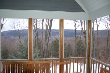 1 Hemlock Road Tyringham, MA 01264 - Photo 10 of 19 a view of a glass door and a yard