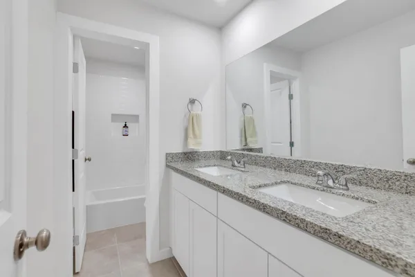 a view of a backyard with large trees