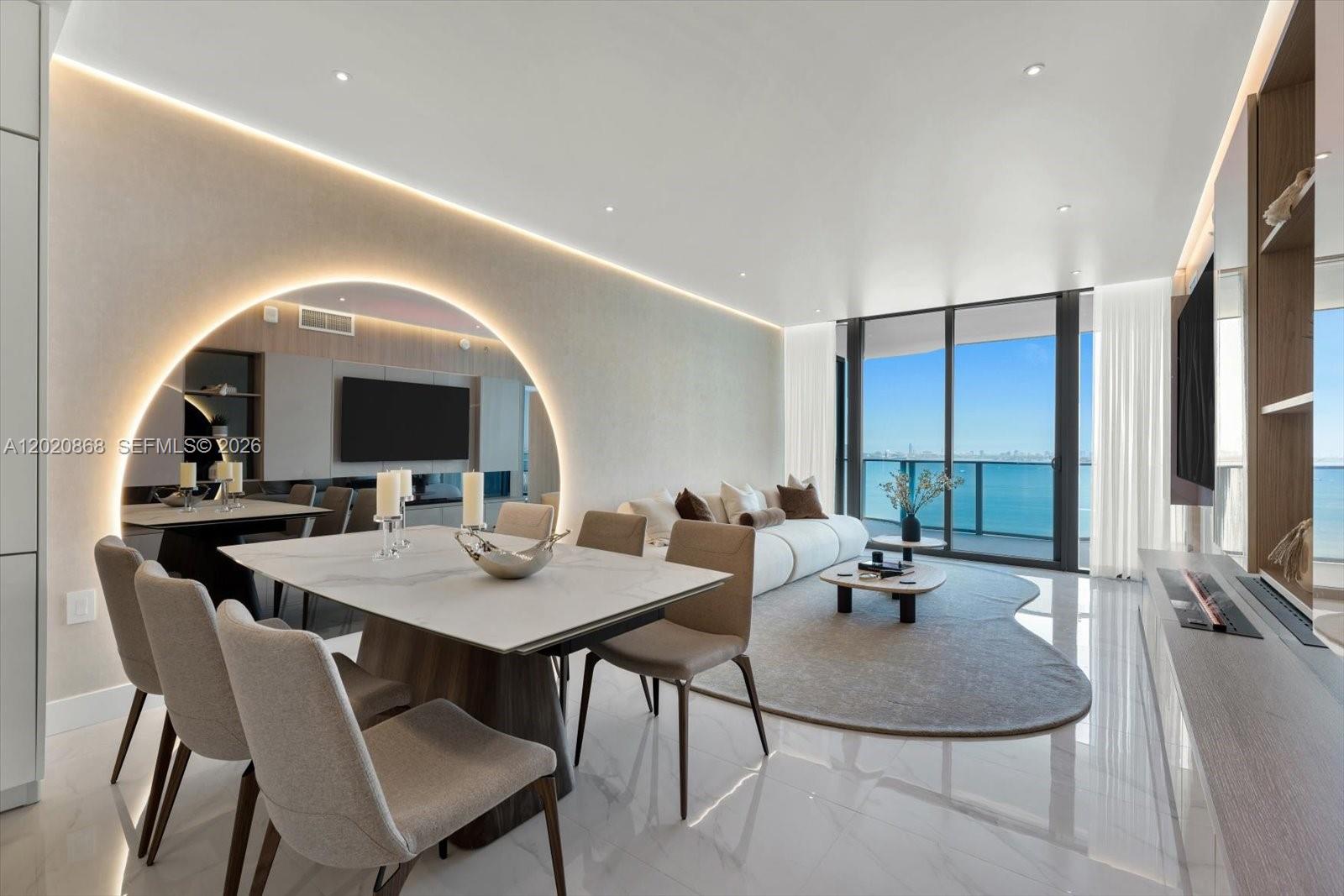 700 Northeast 24th Street, Unit 1602 Miami, FL 33137 - Photo 11 of 30 a view of a dining room with furniture