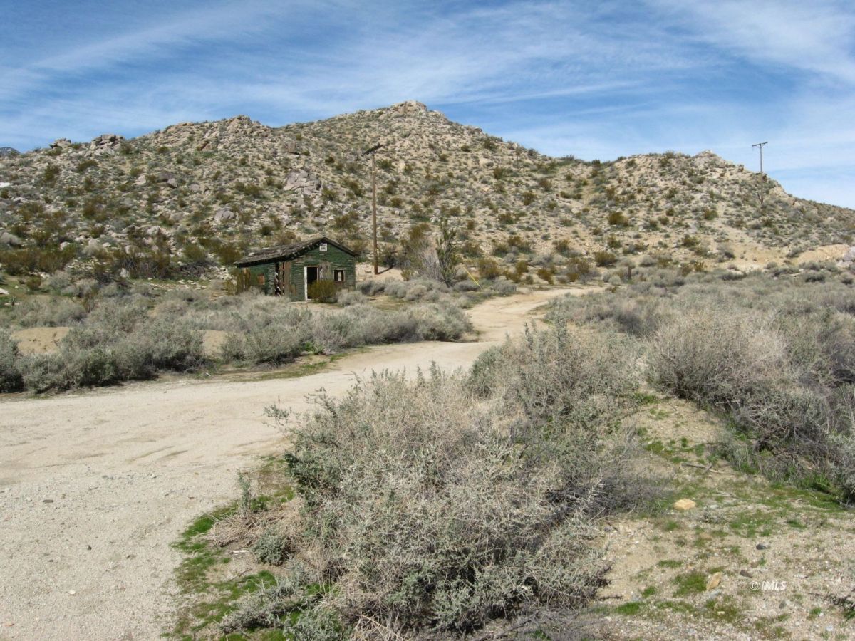 350 Little Lake Road Inyokern, CA 93527 - Photo 12 of 26 a view of a large building with a mountain in the background