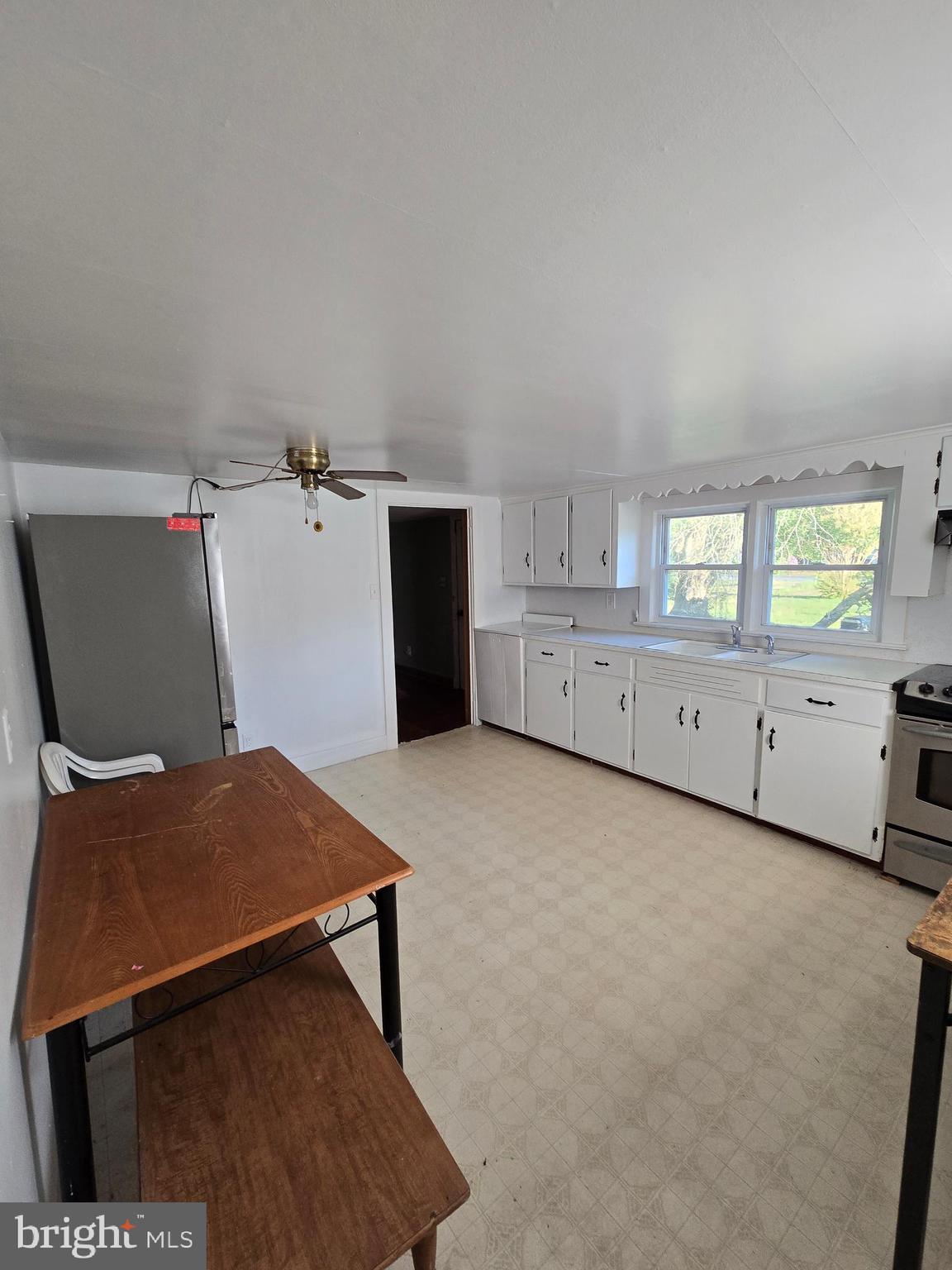 5258 Preston Road Federalsburg, MD 21632 - Photo 6 of 19 a view of a storage & utility room with two washing machine