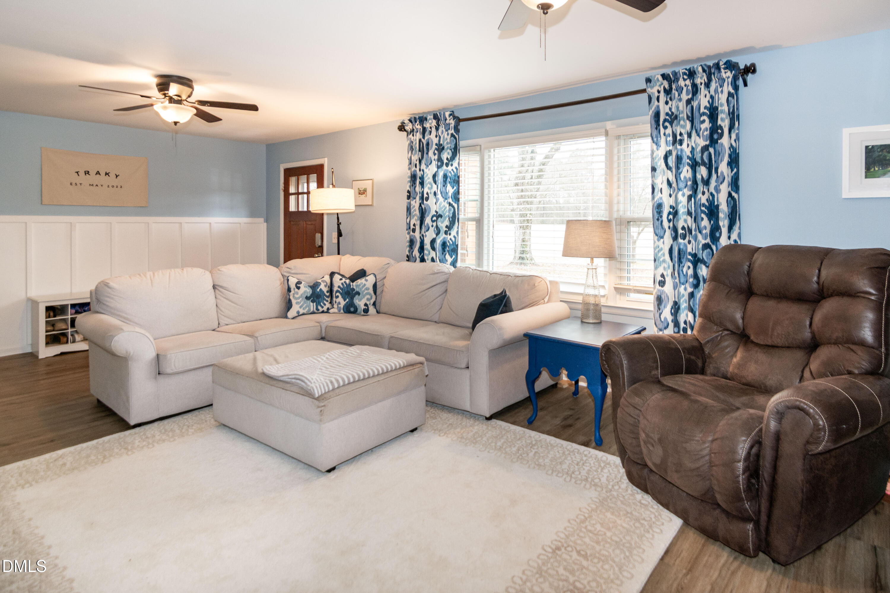 1009 Old Ferrell Road Knightdale, NC 27545 - Photo 13 of 42 a living room with furniture and a large window