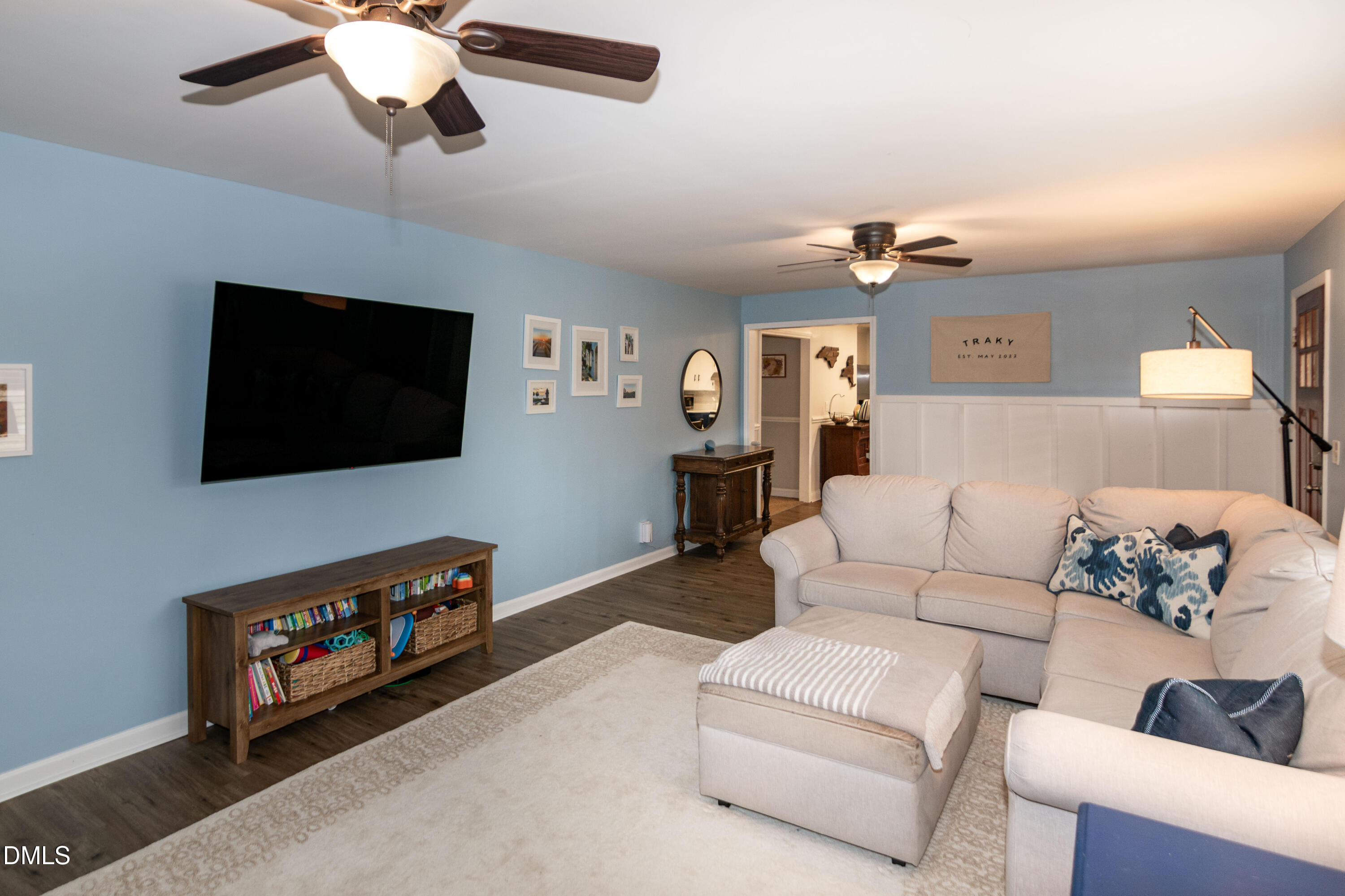 1009 Old Ferrell Road Knightdale, NC 27545 - Photo 14 of 42 a living room with furniture and a flat screen tv
