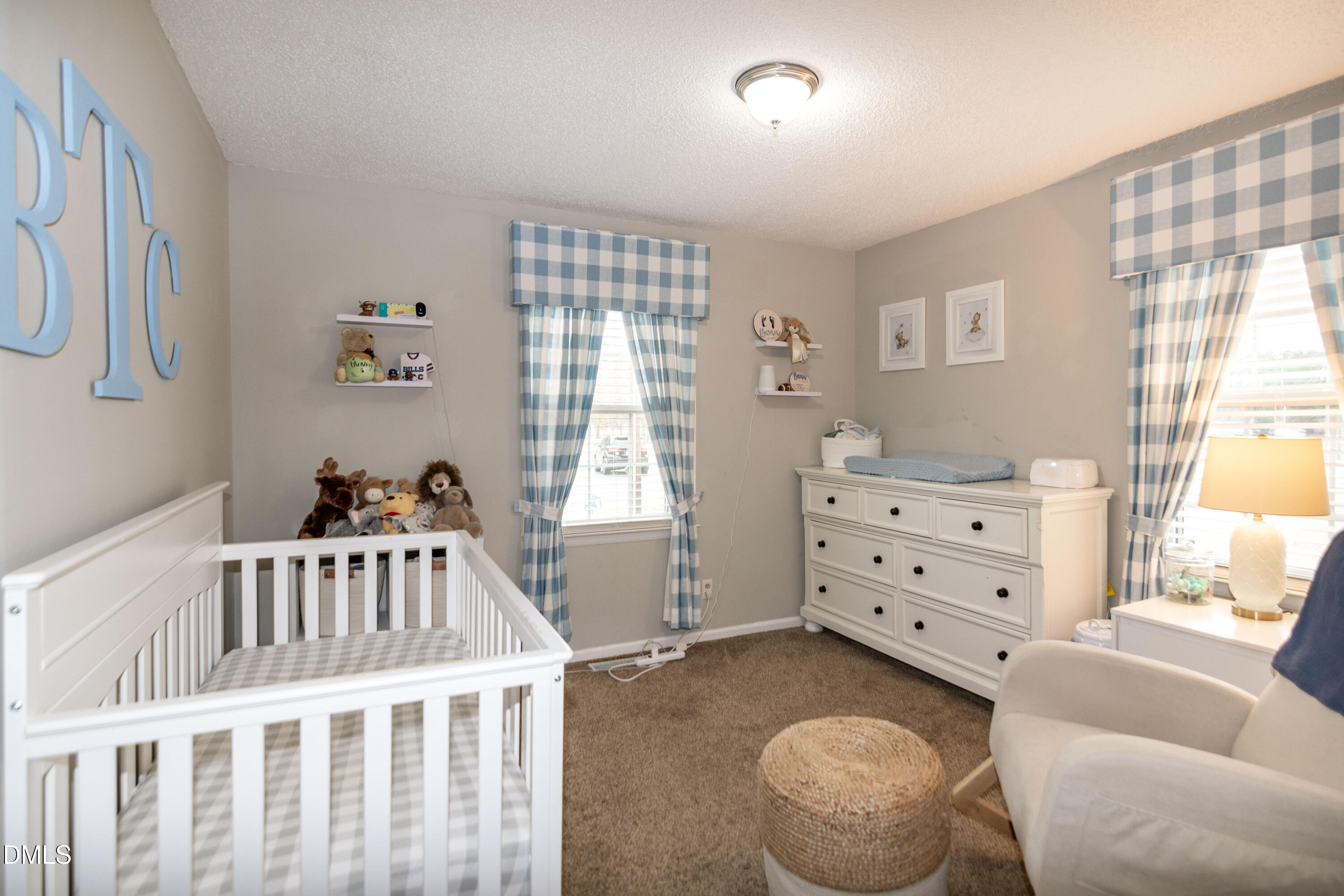 1009 Old Ferrell Road Knightdale, NC 27545 - Photo 23 of 42 a bedroom with furniture and a window