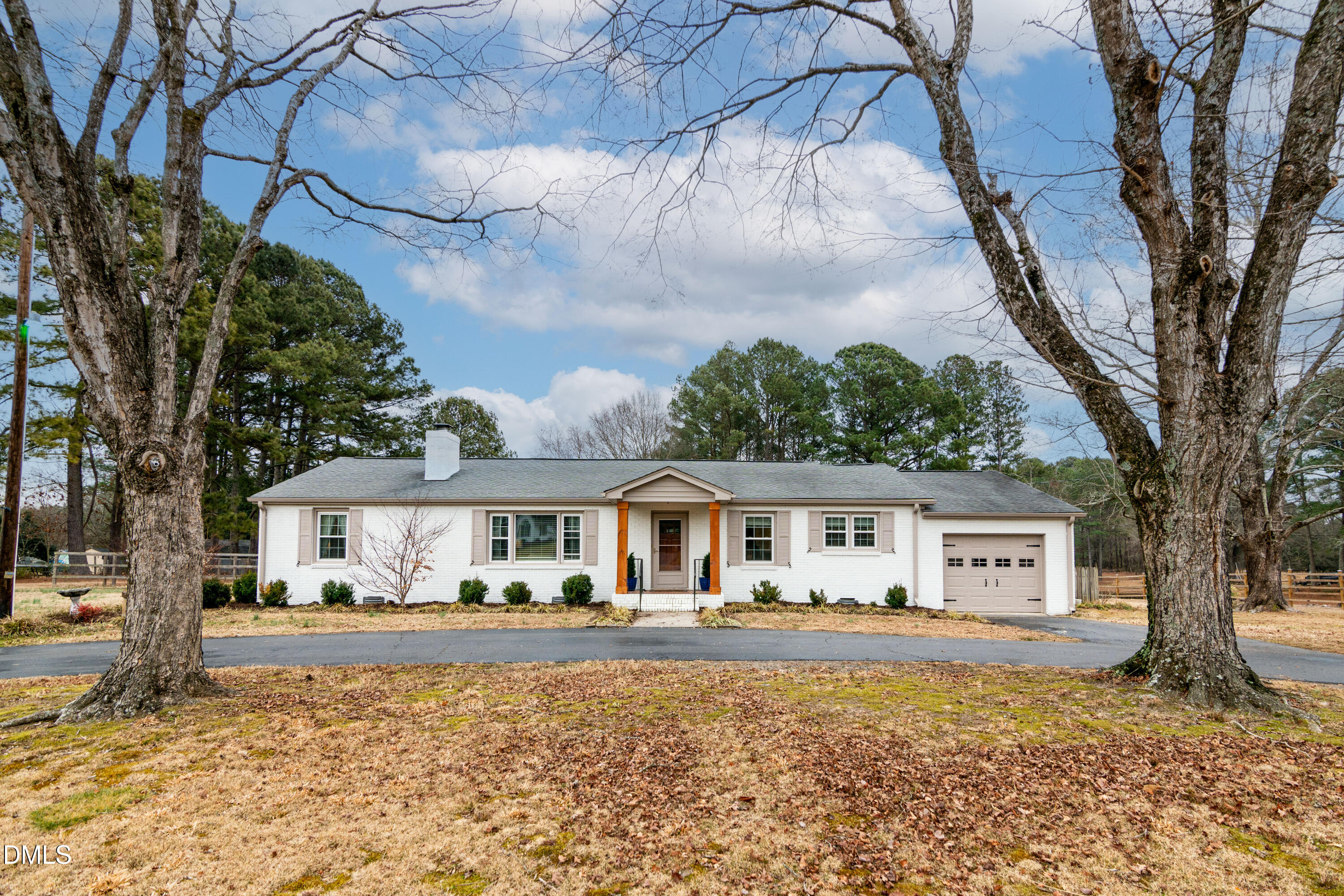 1009 Old Ferrell Road Knightdale, NC 27545 - Photo 30 of 42 a front view of a house with garden