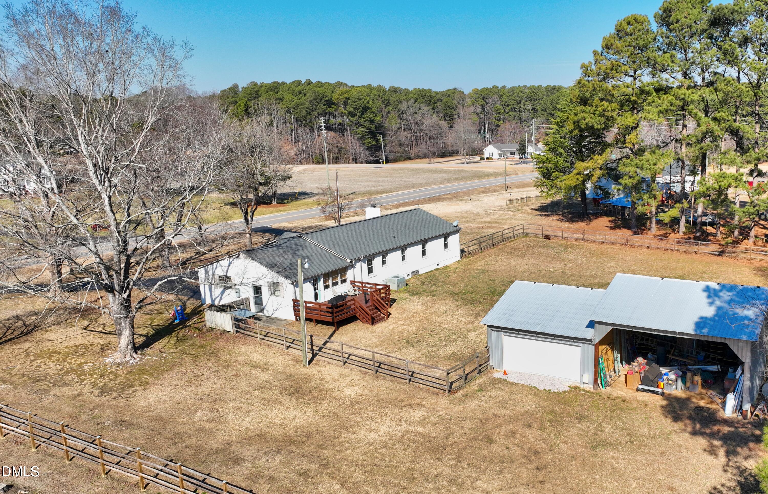 1009 Old Ferrell Road Knightdale, NC 27545 - Photo 3 of 42 a view of a backyard with sitting area