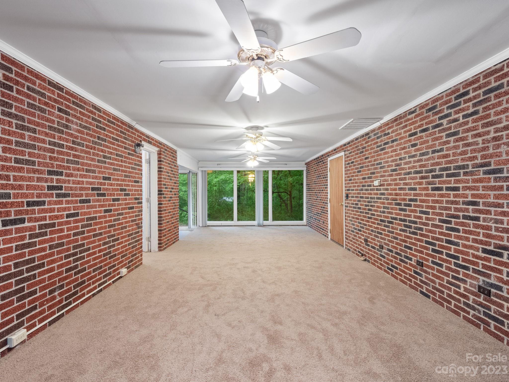 978 South Grandview Road Clover, SC 29710 - Photo 31 of 45 a view of a livingroom with a ceiling fan and window