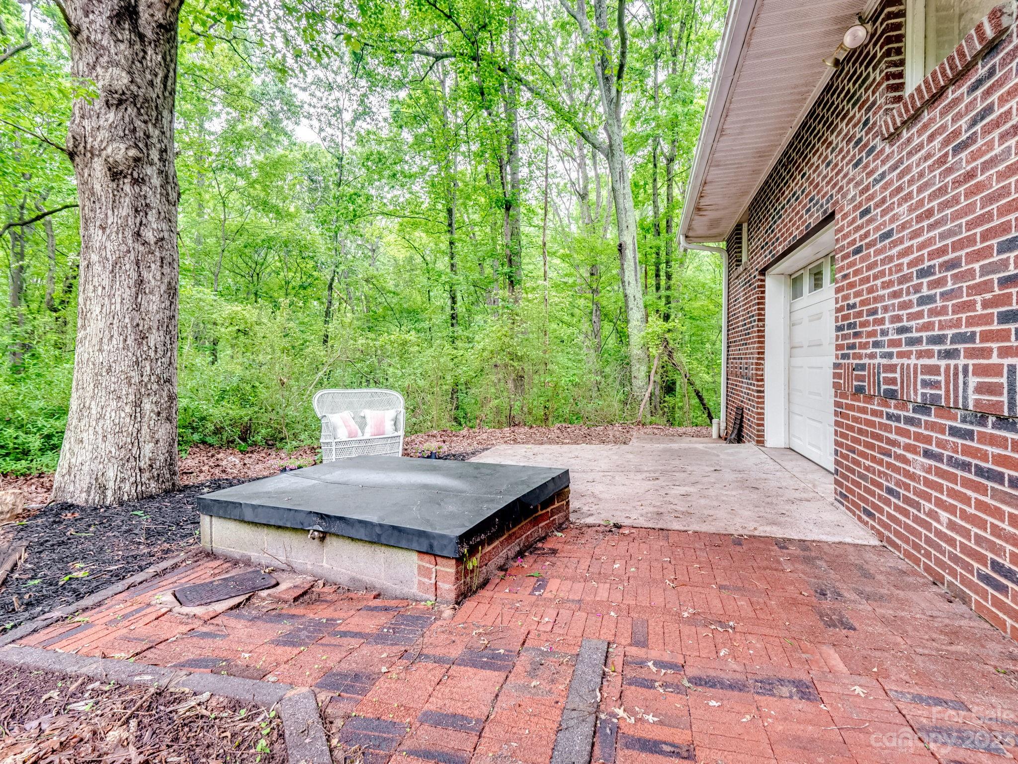 978 South Grandview Road Clover, SC 29710 - Photo 35 of 45 a view of a backyard with large trees and plants