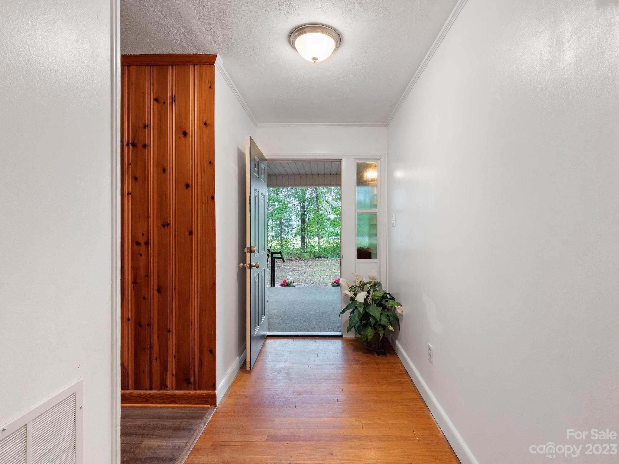 978 South Grandview Road Clover, SC 29710 - Photo 6 of 45 an empty room with wooden floor and windows