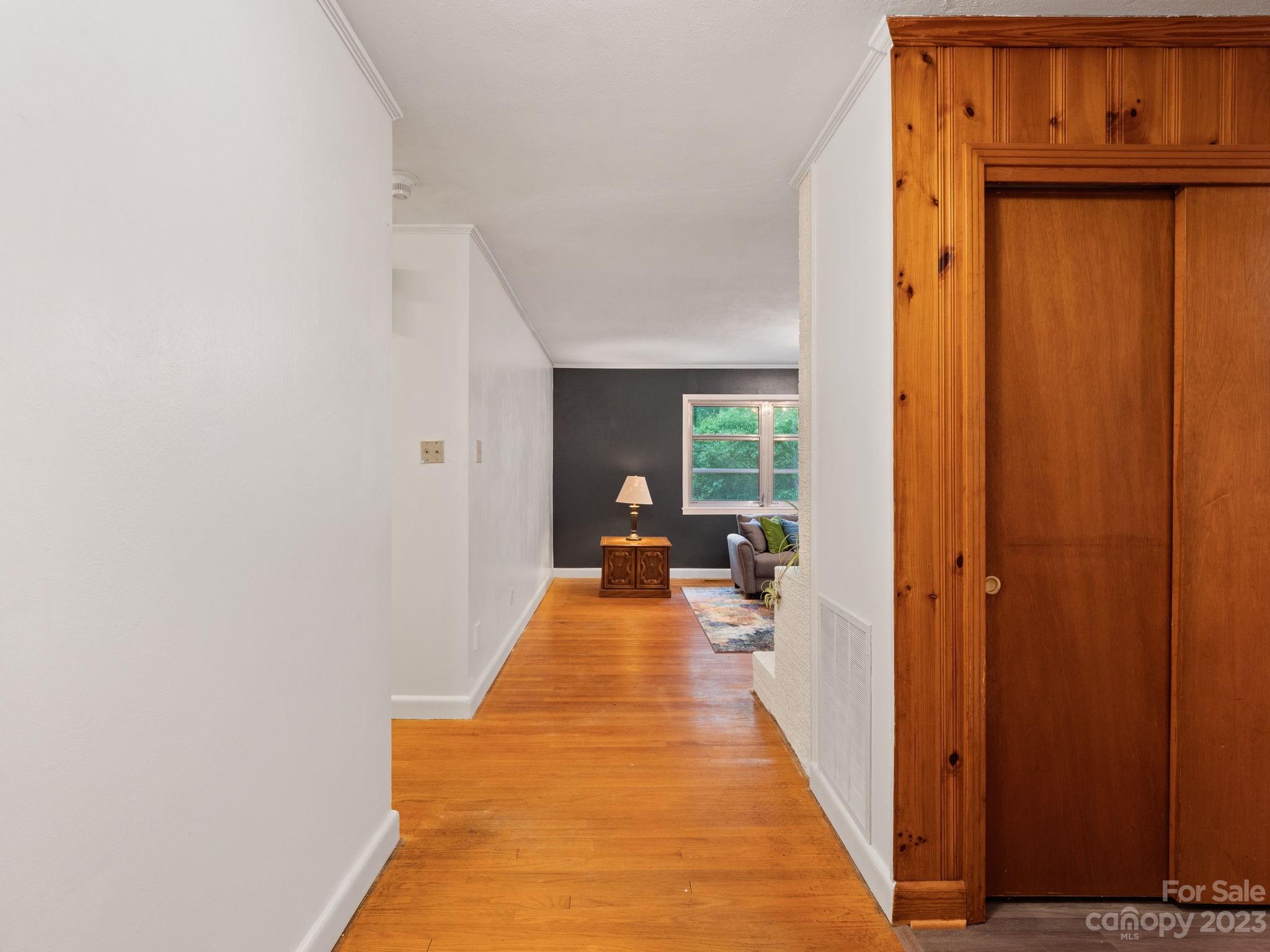 978 South Grandview Road Clover, SC 29710 - Photo 7 of 45 a hallway with wooden floor windows and a livingroom