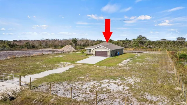 a view of a lake with a big yard