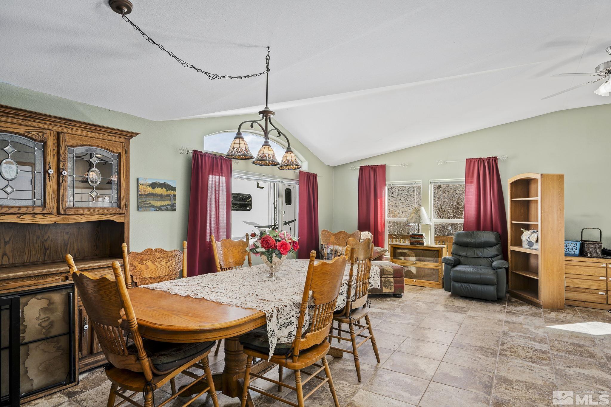 3880 Tree Farm Court Reno, NV 89510 - Photo 15 of 36 a view of a dining room with furniture