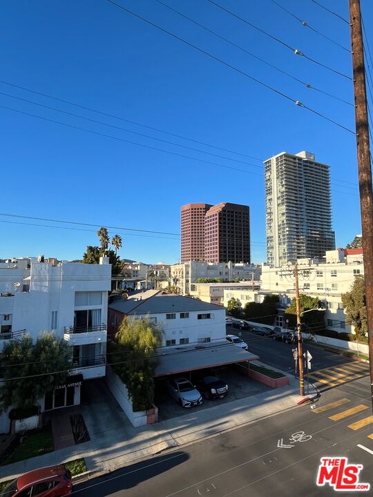 1301 South Westgate Avenue, Unit 302 Los Angeles, CA 90025 - Photo 11 of 12 a view of balcony with outdoor seating