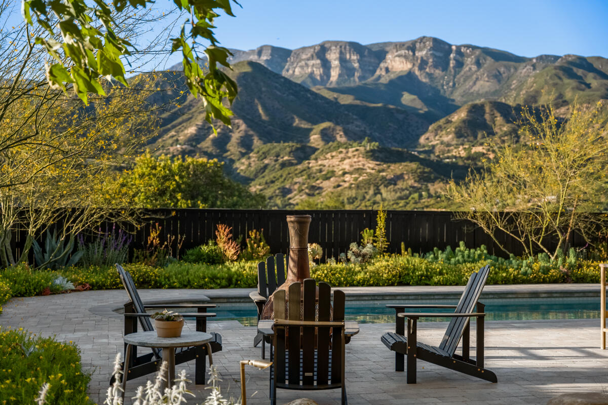 13100 Ojai Road Santa Paula, CA 93060 - Photo 57 of 60 a view of a chairs and table on the wooden floor
