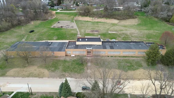a view of swimming pool with a yard