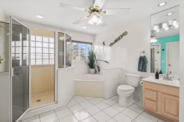 a bedroom with a bed dresser and a window