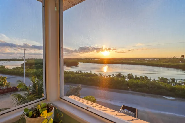 a bathroom with a shower and a sink