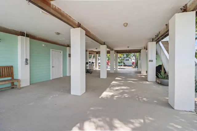 a view of swimming pool with outdoor seating