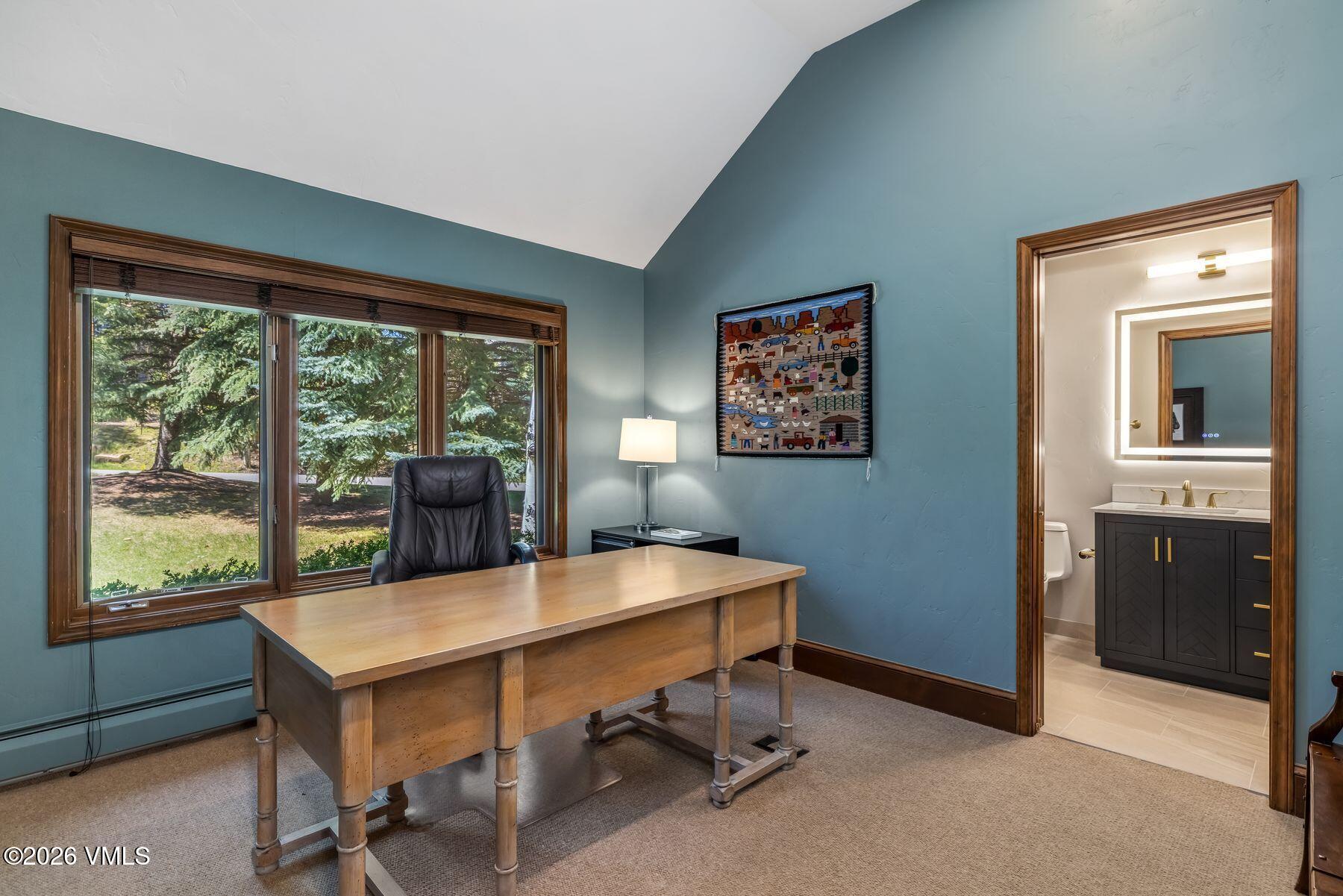 167 Saddle Ridge Edwards, CO 81632 - Photo 29 of 41 a view of a workspace with furniture and a window