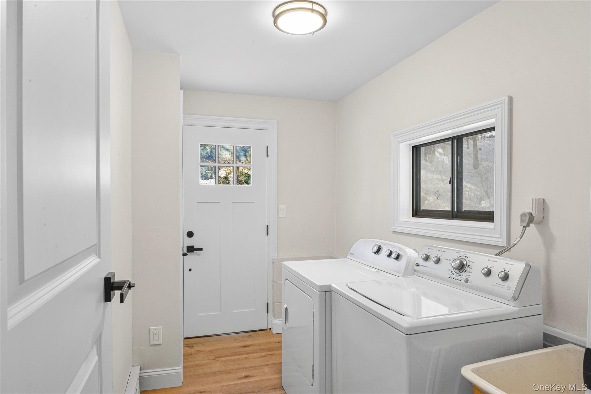 102 Ridge Road Cortlandt Manor, NY 10567 - Photo 8 of 37 Laundry/mudroom leads to garage as well as side exit door