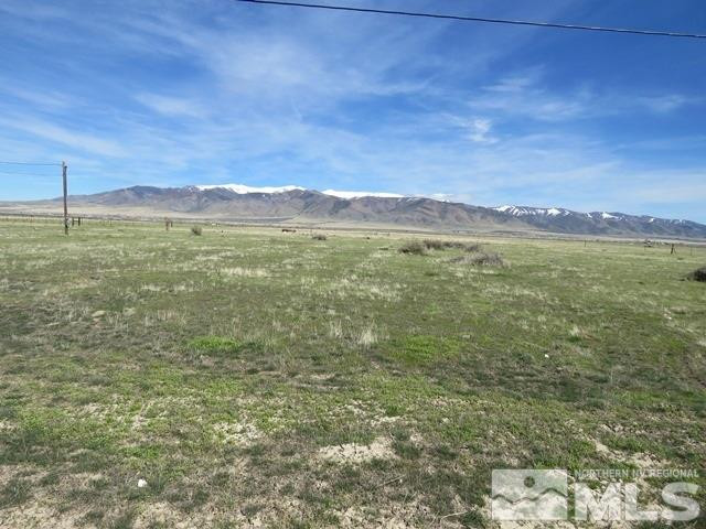 505 McNeil Road Winnemucca, NV 89445 - Photo 1 of 12 a view of a lake with a mountain